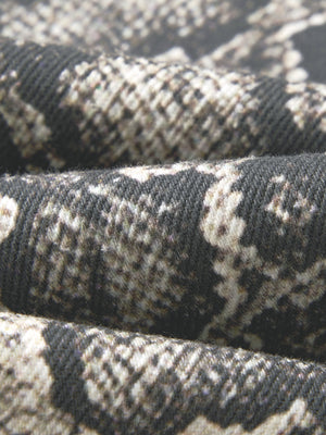 The fabric folded to show its texture, a 360 gsm woven cotton with a visible twill grain