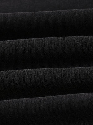 Ribbed hem band of the Snow Washed Gothic Hooded Vest folded, showing the 320 gsm cotton texture