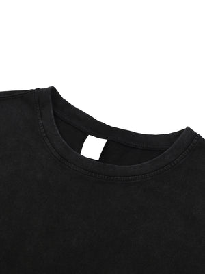Close-up of the ribbed crew collar with the woven label stitched inside the neck seam