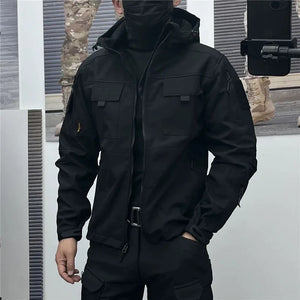 Black soft shell techwear jacket with fleece lining