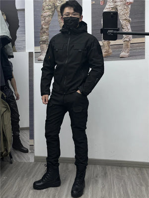 Black soft shell techwear jacket with fleece lining