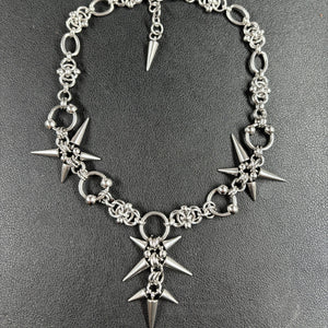 Stainless steel necklace with spiked star clusters on a chunky chain