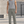 Man in Gray Straight Leg Gym Sweatpants and a gray tank top, front view on a concrete outdoor training spot