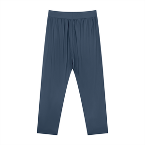Blue athletic pants laid flat from the back, showing the straight ankle length legs and plain seat