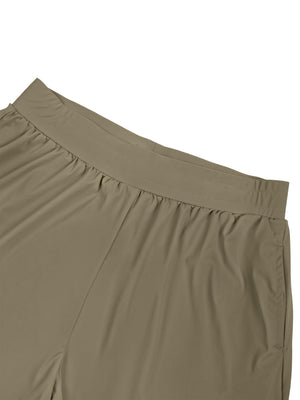 Close-up of the Khaki pants waistband, smooth elastic band with gathered fabric and a front seam