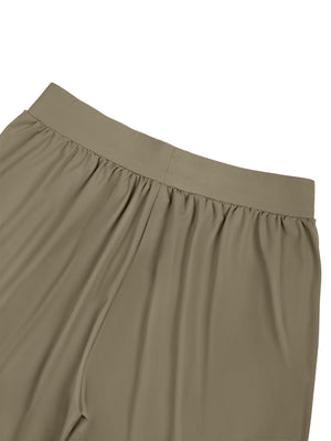 Close-up of the inside of the Khaki waistband, showing the elastic gathering and the knit fabric