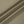 Close-up of the Khaki nylon and spandex knit used for the straight leg athletic pants, smooth surface