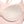 Close-up of a padded cup inside the light pink sports bra, the pad sitting in the cup lining