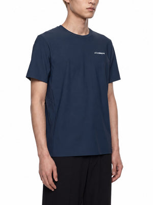 Navy Blue training t-shirt in a three-quarter front view on a model, white chest wordmark