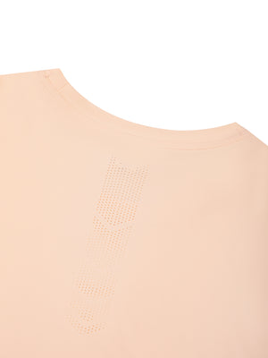 Close-up of the perforated arrow panel below the collar on the back of the Light Pink t-shirt