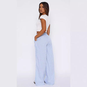 Back three-quarter view of the sky blue striped wide leg trousers, showing the hip pocket and full leg