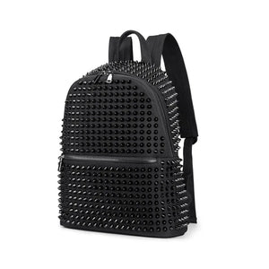 Black canvas backpack covered in black cone studs with a double zip closure