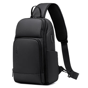 Black sling bag sized for a 7.9 inch tablet with a wide chest strap