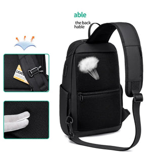 Black sling bag sized for a 7.9 inch tablet with a wide chest strap
