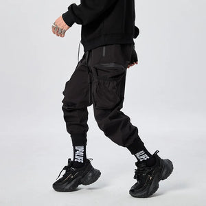 Black tactical multi pocket cargo pants in a regular fit