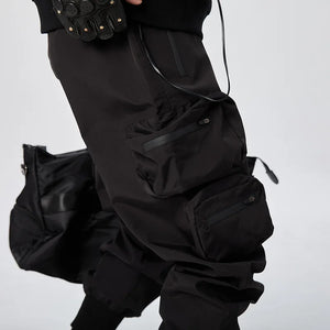 Black tactical multi pocket cargo pants in a regular fit