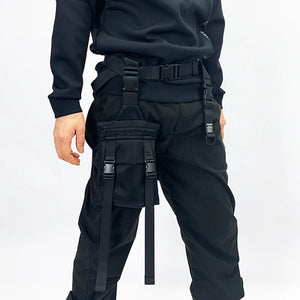 Black tactical techwear leg bag strapped to the thigh