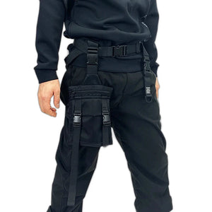 Black tactical techwear leg bag strapped to the thigh
