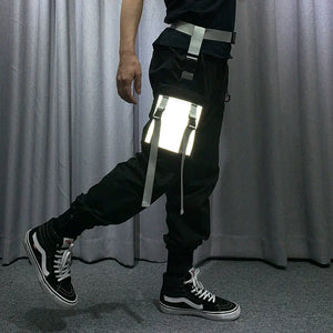 Black tactical techwear leg bag strapped to the thigh