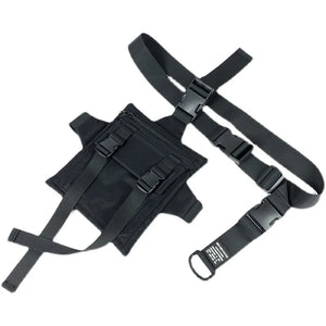 Black tactical techwear leg bag strapped to the thigh