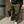 Army green Tapered Cargo Jogger Pants, model in sneakers, large flap cargo pocket and cuffed ankle