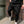 Black Tapered Cargo Jogger Pants, side view with a thigh cargo pocket, mid waist and cuffed ankle