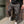 Gray Tapered Cargo Jogger Pants worn with white sneakers, cargo pocket on the leg and elastic cuff