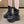 Tech Wear Boots Black worn by a model, front view of the chunky lug sole, laces and wrapped ankle straps
