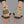 Techwear Fingerless Patchwork Gloves worn by a person, close-up on both hands, front view on a grey studio background