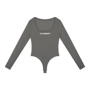 Gray colourway of the long sleeve bodysuit laid flat from the front, white CYBER wordmark on the chest