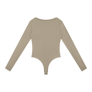 Back of the Khaki thumbhole bodysuit laid flat, plain beige knit with long sleeves and a high-cut bottom