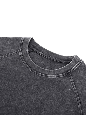 Round rib neckline of the Tiger Tank Top Y2K seen close up on the washed black cotton