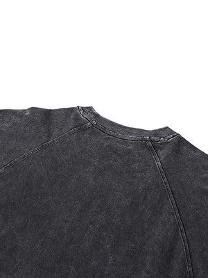 Shoulder seam of the Tiger Tank Top Y2K seen from above, in washed black cotton jersey