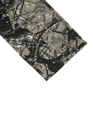 The hem folded back to show the reverse of the woven cotton behind the printed face