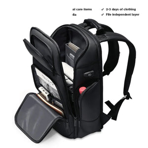 Black hardshell backpack with an external USB charging port and a 17 inch laptop sleeve