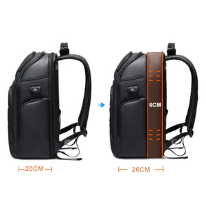 Black hardshell backpack with an external USB charging port and a 17 inch laptop sleeve