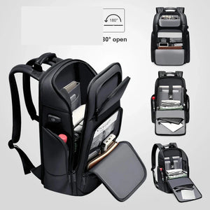 Black hardshell backpack with an external USB charging port and a 17 inch laptop sleeve