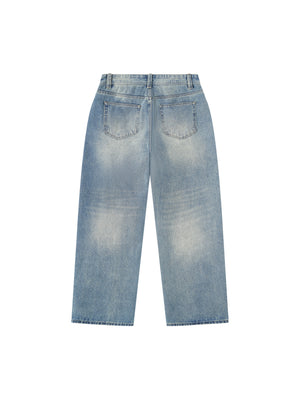 Back view of the jeans laid flat in full length, two plain back pockets and a faded blue seat