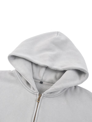 Close-up of the hood and the two-way zip, the slider sitting at the base of the placket
