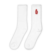Calcetines deportivos largos blancos y rojos