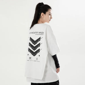 Person wearing a white long-sleeve shirt with black text and graphics on the back, standing against a plain background.