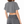 Back view of the grey washed crop top on a model, plain back, dropped shoulders and a short cropped hem