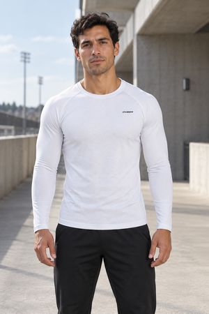 Man in the White Workout Long Sleeve Compression Shirt outdoors, front view with the small black CYBER logo
