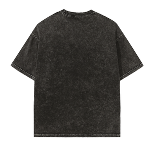 Back of the washed black Y2K cyber graphic tee laid flat, plain back with dropped shoulders and frayed edges