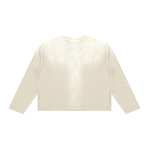 Back of the apricot long sleeve tee, left plain so the sunfade wash across the shoulders shows