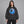 Y2k hoodie oversized i vasket sort – båret af en kvinde