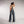 Zip Denim Y2K Overalls in mid blue, back view showing the shoulder straps and the rear pockets