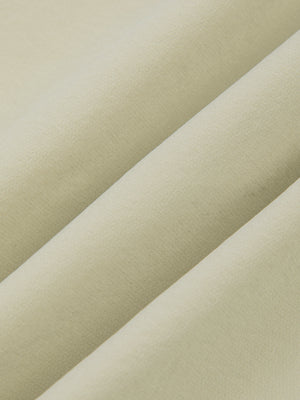 Bean Green nylon stretch fabric of the basketball shorts in soft folds, smooth matte surface