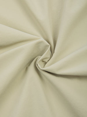 Swirl of the Bean Green woven fabric used for the zip pocket basketball shorts, close texture view