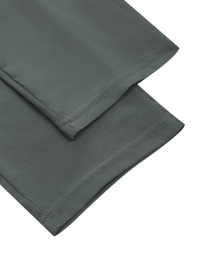 Detail of the straight hem on the Gray gym joggers, two folded legs on a white background